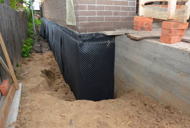 Happy homeowners after waterproofing job in East Amherst